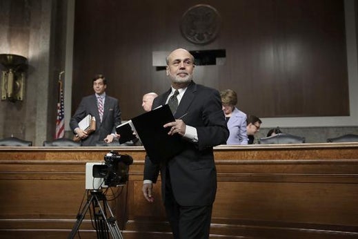 Federal Reserve Board Chairman Ben Bernanke leaves after he testified at a hearing before the Joint Economic Committee May 22, 2013 on Capitol Hill in Washington, DC.